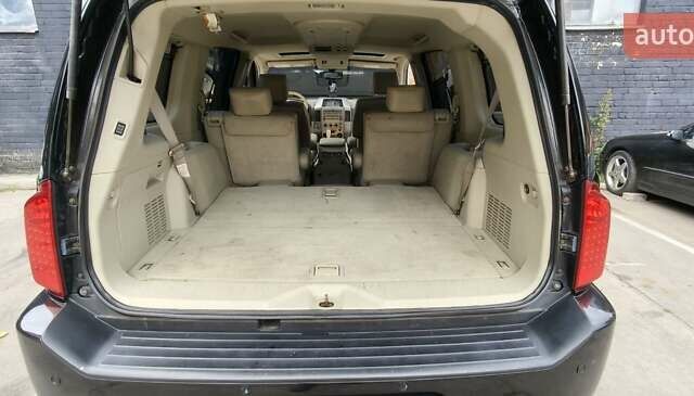 Чорний Інфініті QX56, об'ємом двигуна 5.6 л та пробігом 290 тис. км за 9000 $, фото 17 на Automoto.ua