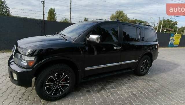 Чорний Інфініті QX56, об'ємом двигуна 5.6 л та пробігом 290 тис. км за 9000 $, фото 10 на Automoto.ua