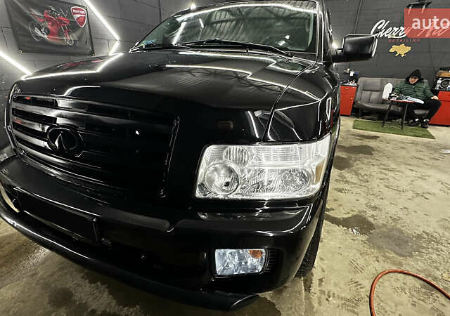 Чорний Інфініті QX56, об'ємом двигуна 5.6 л та пробігом 320 тис. км за 12500 $, фото 2 на Automoto.ua