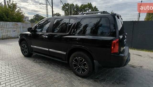 Чорний Інфініті QX56, об'ємом двигуна 5.6 л та пробігом 290 тис. км за 9000 $, фото 2 на Automoto.ua
