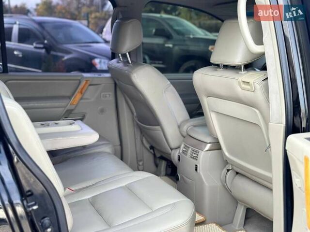 Черный Инфинити QX56, объемом двигателя 5.6 л и пробегом 235 тыс. км за 9499 $, фото 8 на Automoto.ua