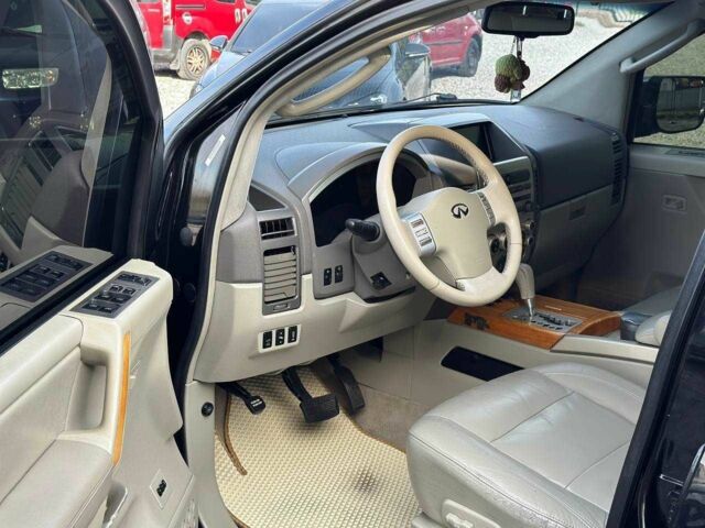 Черный Инфинити QX56, объемом двигателя 5.6 л и пробегом 235 тыс. км за 9499 $, фото 4 на Automoto.ua
