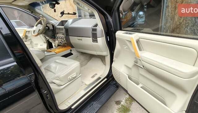 Чорний Інфініті QX56, об'ємом двигуна 5.6 л та пробігом 290 тис. км за 9000 $, фото 18 на Automoto.ua