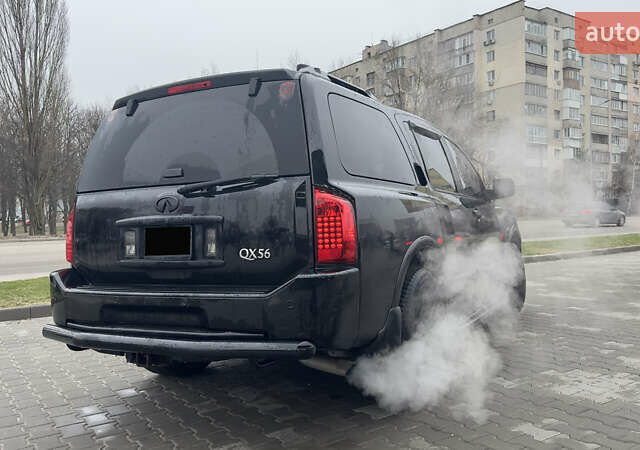 Чорний Інфініті QX56, об'ємом двигуна 5.6 л та пробігом 320 тис. км за 12500 $, фото 8 на Automoto.ua