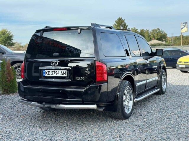 Черный Инфинити QX56, объемом двигателя 5.6 л и пробегом 235 тыс. км за 9499 $, фото 2 на Automoto.ua