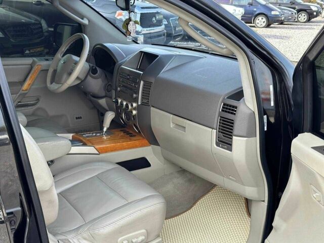 Черный Инфинити QX56, объемом двигателя 5.6 л и пробегом 235 тыс. км за 9499 $, фото 5 на Automoto.ua