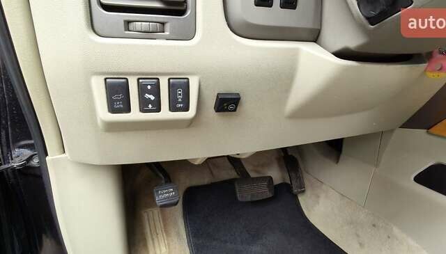 Чорний Інфініті QX56, об'ємом двигуна 5.6 л та пробігом 290 тис. км за 9000 $, фото 16 на Automoto.ua