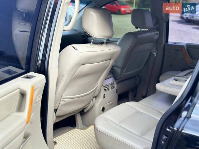 Чорний Інфініті QX56, об'ємом двигуна 5.6 л та пробігом 235 тис. км за 8800 $, фото 6 на Automoto.ua