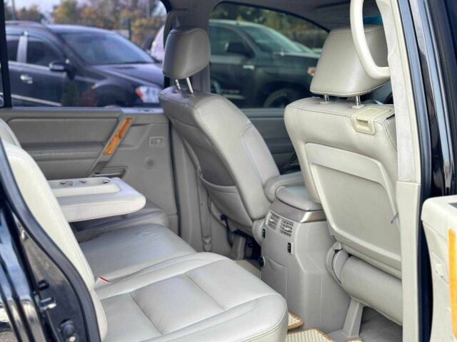 Черный Инфинити QX56, объемом двигателя 5.6 л и пробегом 235 тыс. км за 9499 $, фото 8 на Automoto.ua