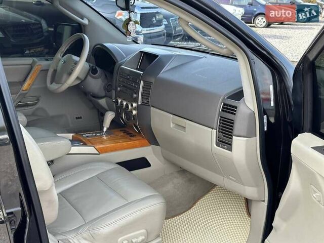 Черный Инфинити QX56, объемом двигателя 5.6 л и пробегом 235 тыс. км за 9499 $, фото 5 на Automoto.ua