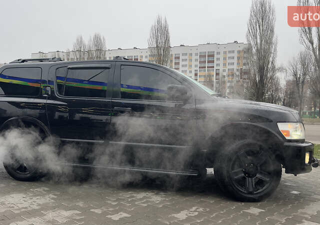 Чорний Інфініті QX56, об'ємом двигуна 5.6 л та пробігом 320 тис. км за 12500 $, фото 9 на Automoto.ua