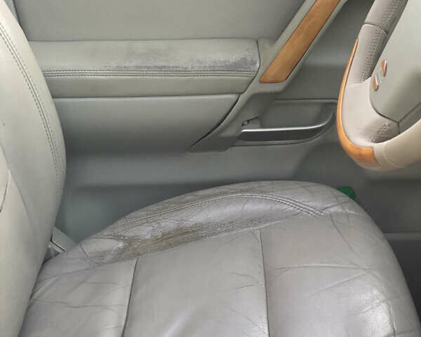 Чорний Інфініті QX56, об'ємом двигуна 5.6 л та пробігом 284 тис. км за 10000 $, фото 16 на Automoto.ua