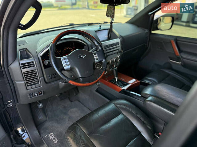 Чорний Інфініті QX56, об'ємом двигуна 5.55 л та пробігом 170 тис. км за 8500 $, фото 4 на Automoto.ua