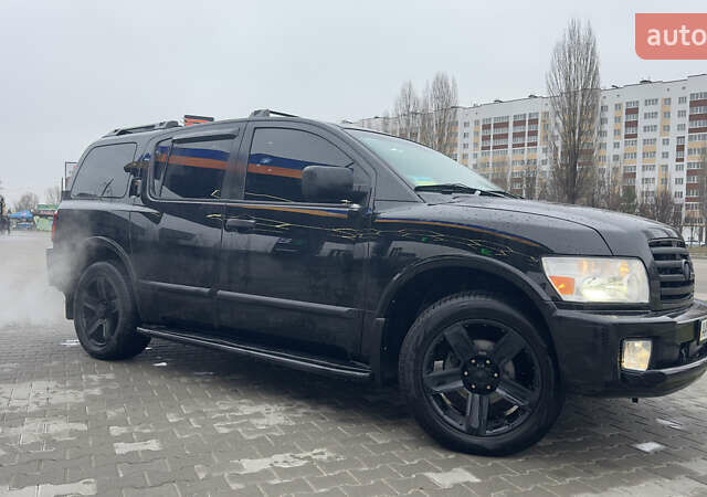 Чорний Інфініті QX56, об'ємом двигуна 5.6 л та пробігом 320 тис. км за 12500 $, фото 10 на Automoto.ua