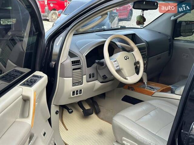 Черный Инфинити QX56, объемом двигателя 5.6 л и пробегом 235 тыс. км за 9499 $, фото 4 на Automoto.ua