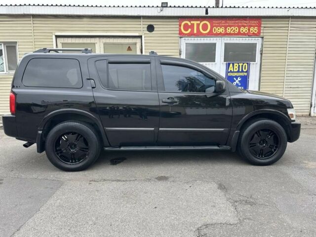 Чорний Інфініті QX56, об'ємом двигуна 5.6 л та пробігом 158 тис. км за 8499 $, фото 14 на Automoto.ua