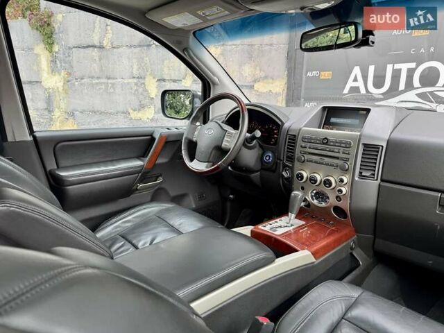Черный Инфинити QX56, объемом двигателя 5.6 л и пробегом 108 тыс. км за 10500 $, фото 4 на Automoto.ua