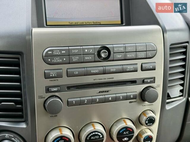 Черный Инфинити QX56, объемом двигателя 5.6 л и пробегом 108 тыс. км за 10500 $, фото 10 на Automoto.ua