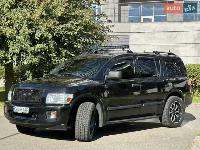 Черный Инфинити QX56, объемом двигателя 5.6 л и пробегом 250 тыс. км за 9890 $, фото 24 на Automoto.ua