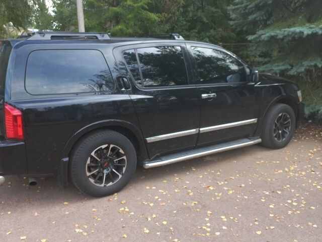 Черный Инфинити QX56, объемом двигателя 5 л и пробегом 233 тыс. км за 12000 $, фото 2 на Automoto.ua