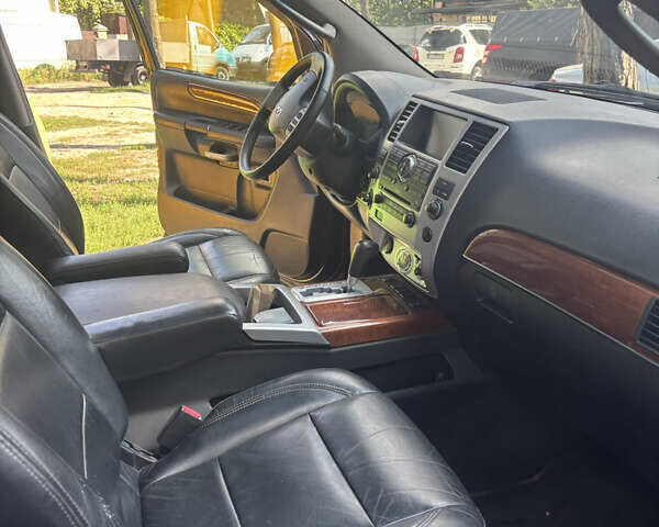 Черный Инфинити QX56, объемом двигателя 5.55 л и пробегом 450 тыс. км за 8000 $, фото 7 на Automoto.ua