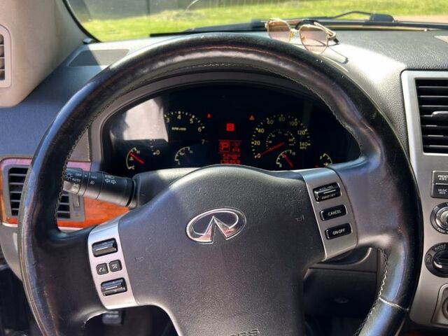 Черный Инфинити QX56, объемом двигателя 5.6 л и пробегом 283 тыс. км за 12000 $, фото 11 на Automoto.ua