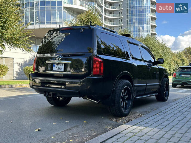 Черный Инфинити QX56, объемом двигателя 5.6 л и пробегом 250 тыс. км за 9890 $, фото 6 на Automoto.ua