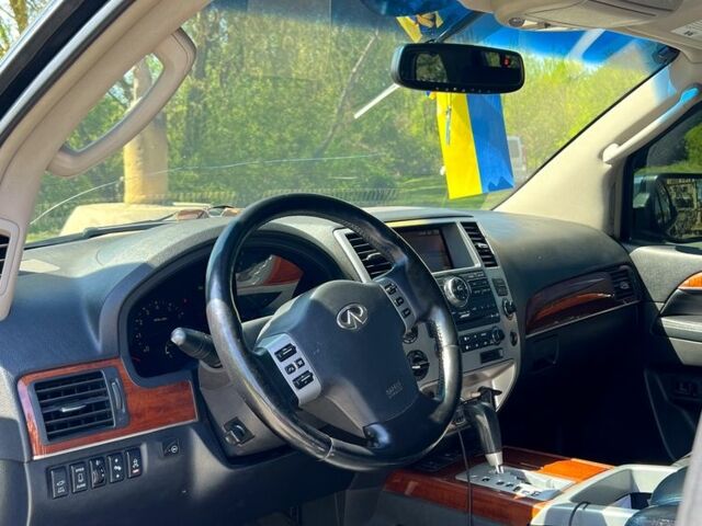 Черный Инфинити QX56, объемом двигателя 5.6 л и пробегом 283 тыс. км за 12000 $, фото 10 на Automoto.ua