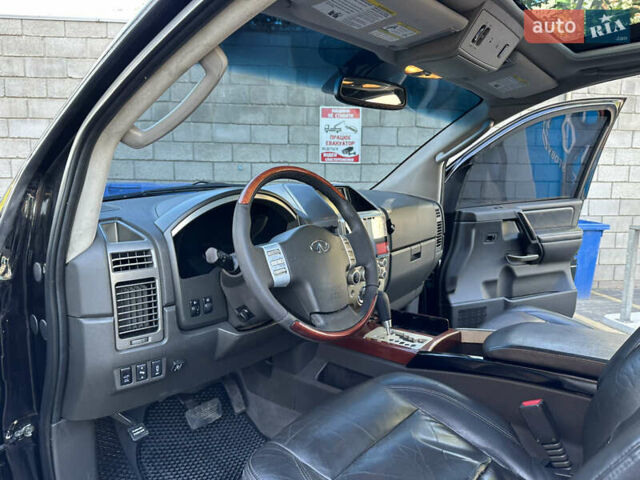 Черный Инфинити QX56, объемом двигателя 5.6 л и пробегом 250 тыс. км за 9890 $, фото 56 на Automoto.ua