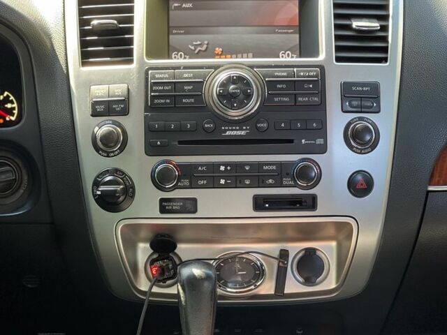 Черный Инфинити QX56, объемом двигателя 5.6 л и пробегом 283 тыс. км за 12000 $, фото 12 на Automoto.ua