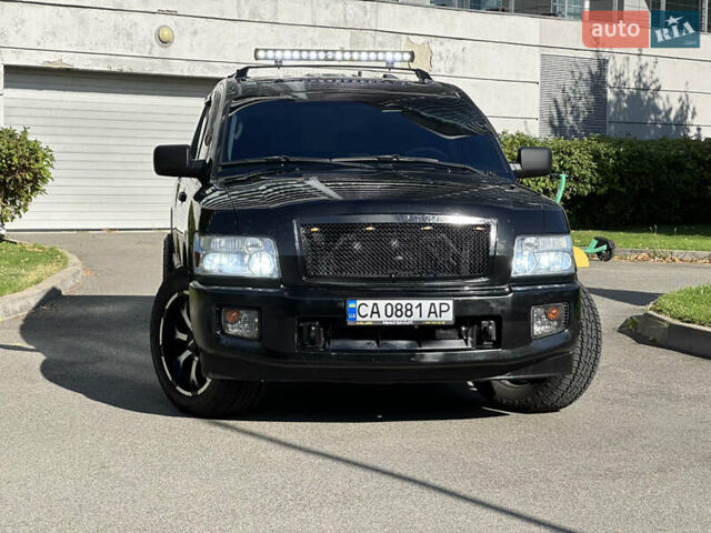 Черный Инфинити QX56, объемом двигателя 5.6 л и пробегом 250 тыс. км за 9890 $, фото 7 на Automoto.ua