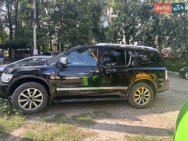 Черный Инфинити QX56, объемом двигателя 5.55 л и пробегом 450 тыс. км за 8000 $, фото 1 на Automoto.ua