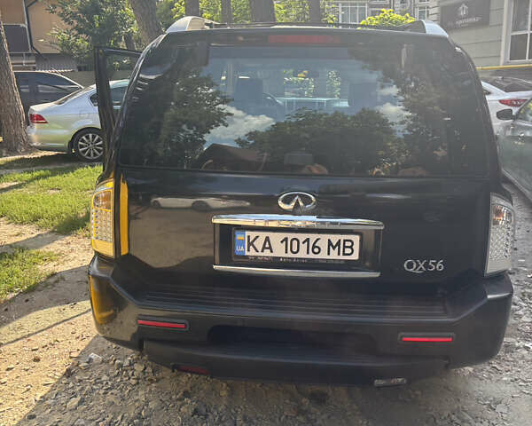 Черный Инфинити QX56, объемом двигателя 5.55 л и пробегом 450 тыс. км за 8000 $, фото 2 на Automoto.ua