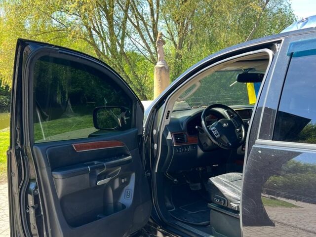 Черный Инфинити QX56, объемом двигателя 5.6 л и пробегом 283 тыс. км за 12000 $, фото 9 на Automoto.ua