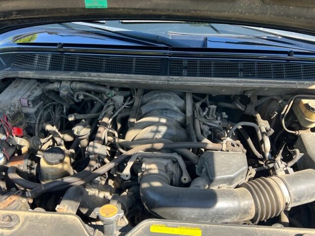 Черный Инфинити QX56, объемом двигателя 5.6 л и пробегом 283 тыс. км за 12000 $, фото 8 на Automoto.ua