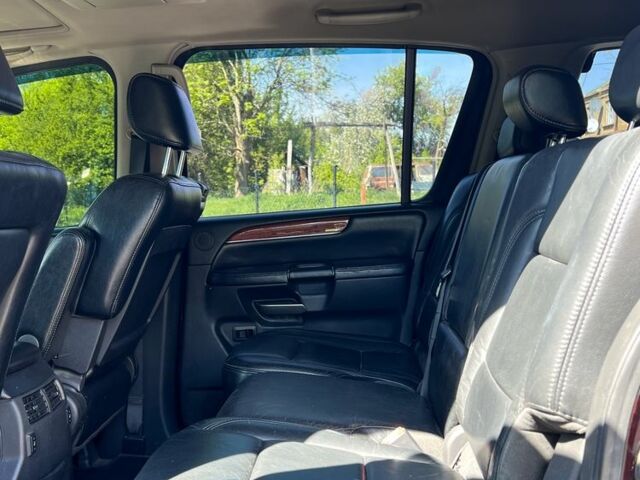 Черный Инфинити QX56, объемом двигателя 5.6 л и пробегом 283 тыс. км за 12000 $, фото 13 на Automoto.ua