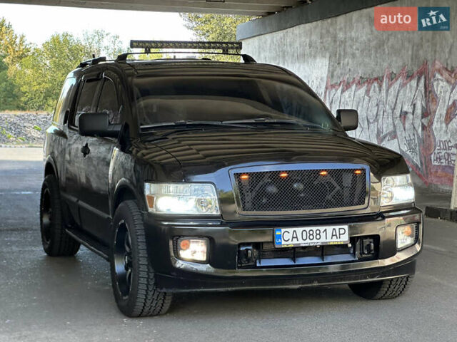 Черный Инфинити QX56, объемом двигателя 5.6 л и пробегом 250 тыс. км за 9890 $, фото 1 на Automoto.ua