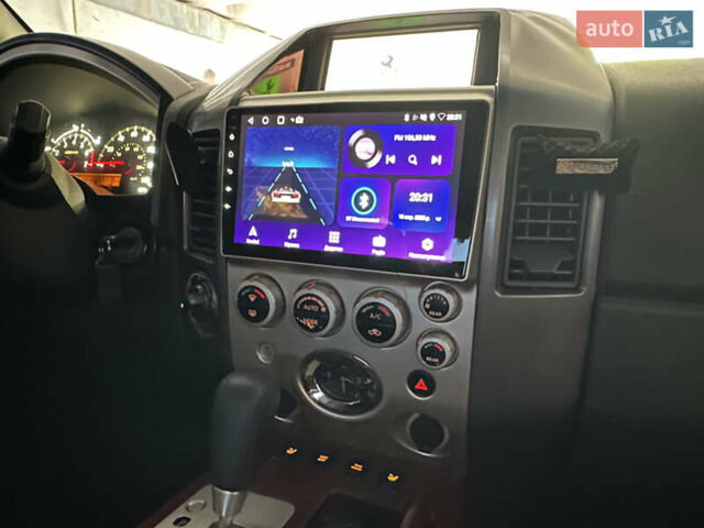Черный Инфинити QX56, объемом двигателя 5.6 л и пробегом 250 тыс. км за 9890 $, фото 15 на Automoto.ua