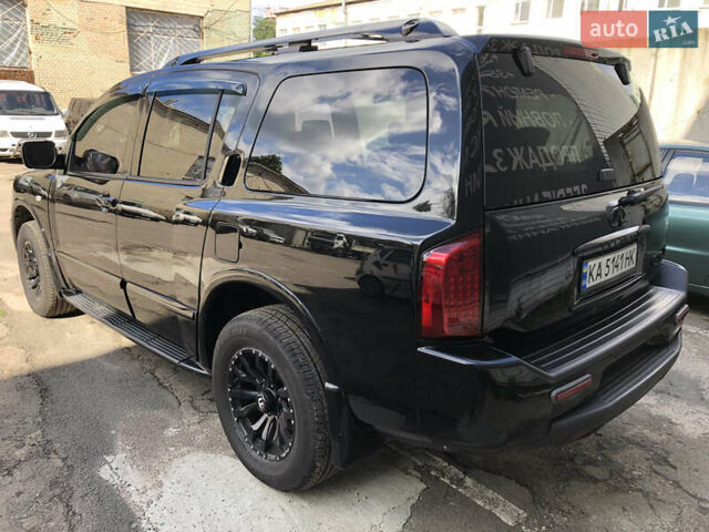Черный Инфинити QX56, объемом двигателя 5.6 л и пробегом 229 тыс. км за 11499 $, фото 2 на Automoto.ua