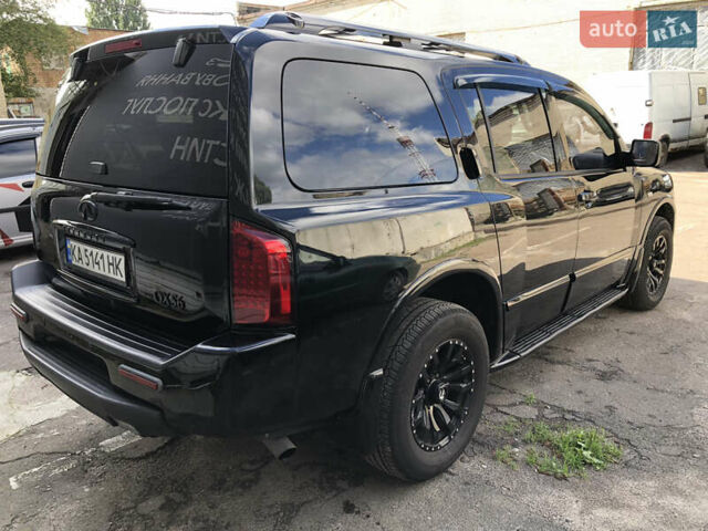 Черный Инфинити QX56, объемом двигателя 5.6 л и пробегом 229 тыс. км за 11499 $, фото 1 на Automoto.ua
