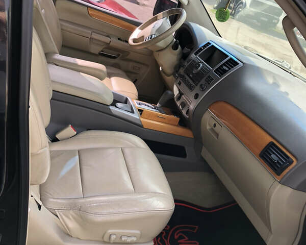 Черный Инфинити QX56, объемом двигателя 5.6 л и пробегом 229 тыс. км за 11499 $, фото 8 на Automoto.ua