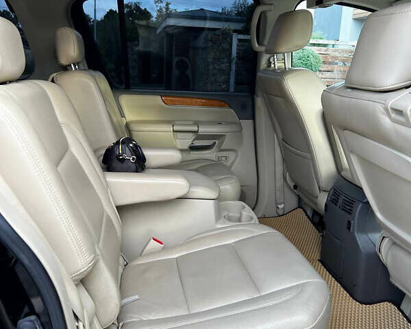 Черный Инфинити QX56, объемом двигателя 5.6 л и пробегом 113 тыс. км за 17500 $, фото 7 на Automoto.ua