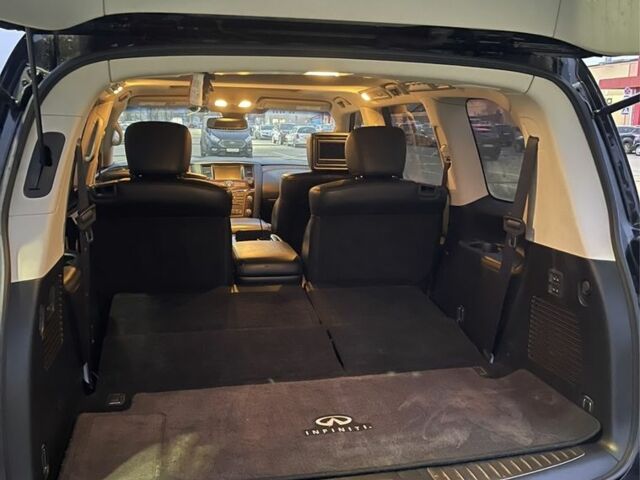 Чорний Інфініті QX56, об'ємом двигуна 5.6 л та пробігом 267 тис. км за 15000 $, фото 4 на Automoto.ua
