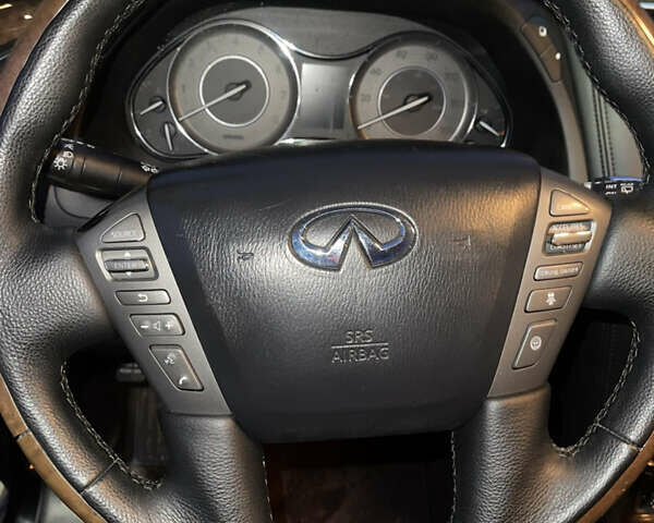Черный Инфинити QX56, объемом двигателя 5.55 л и пробегом 267 тыс. км за 15000 $, фото 28 на Automoto.ua