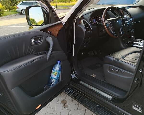 Черный Инфинити QX56, объемом двигателя 5.55 л и пробегом 141 тыс. км за 19100 $, фото 5 на Automoto.ua