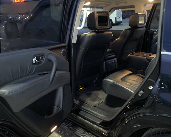 Черный Инфинити QX56, объемом двигателя 5.55 л и пробегом 267 тыс. км за 15000 $, фото 13 на Automoto.ua
