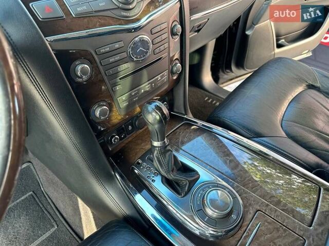 Черный Инфинити QX56, объемом двигателя 5.55 л и пробегом 203 тыс. км за 14600 $, фото 17 на Automoto.ua