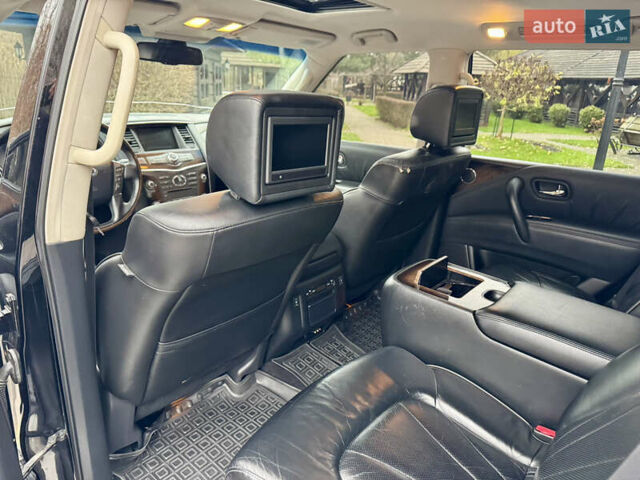Черный Инфинити QX56, объемом двигателя 5.6 л и пробегом 220 тыс. км за 21500 $, фото 65 на Automoto.ua
