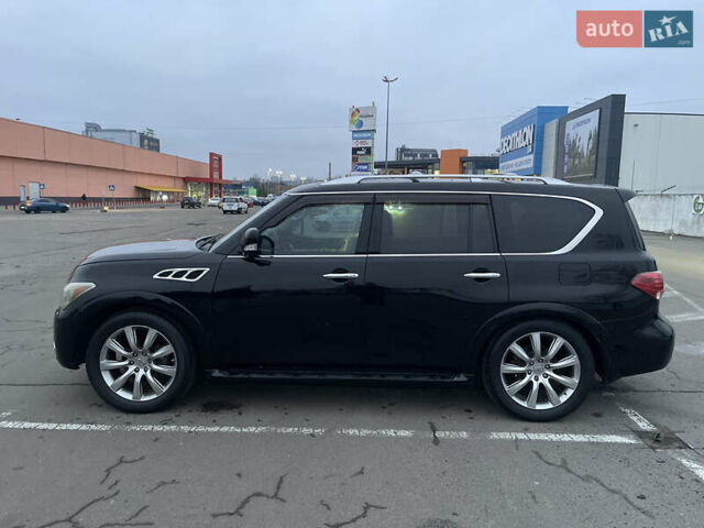 Черный Инфинити QX56, объемом двигателя 5.55 л и пробегом 267 тыс. км за 15000 $, фото 3 на Automoto.ua