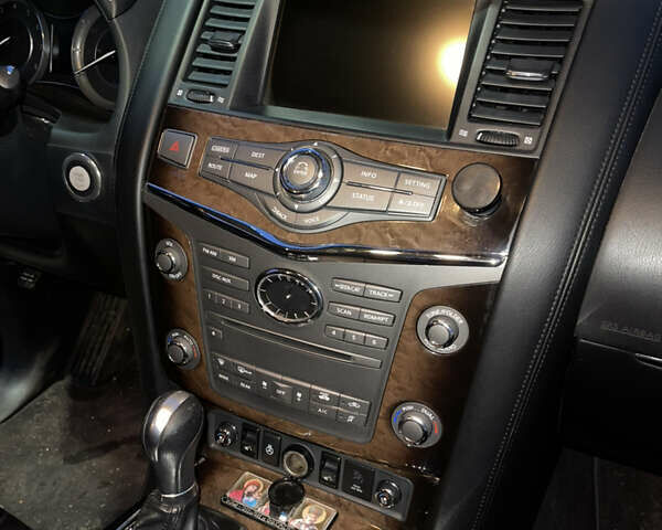 Черный Инфинити QX56, объемом двигателя 5.55 л и пробегом 267 тыс. км за 15000 $, фото 22 на Automoto.ua